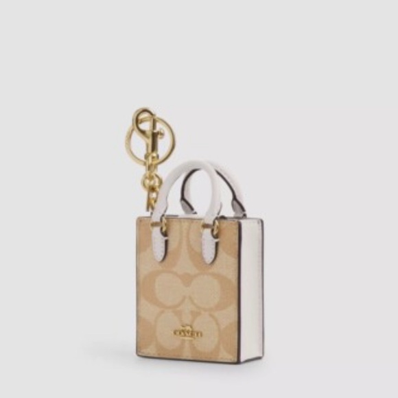 Coach Handbags - Coach Mini Tote Keychain in Tan and White NEW WITHOUT TAGS.